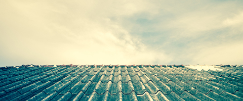 Roof tiles containing asbestos
