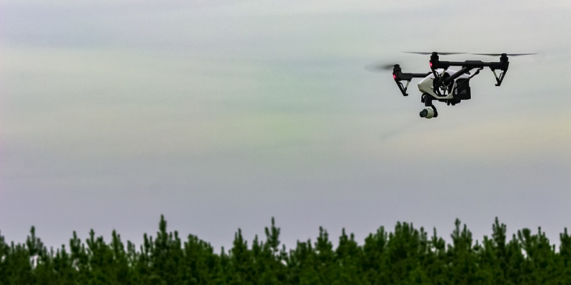 Image of a Drone flying above a field